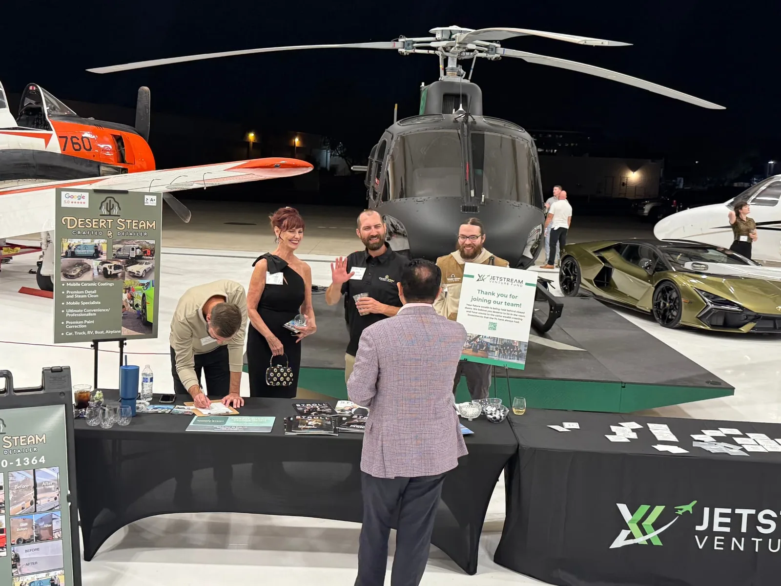 Desert Steam Detail team at an Arizona hangar aviation event