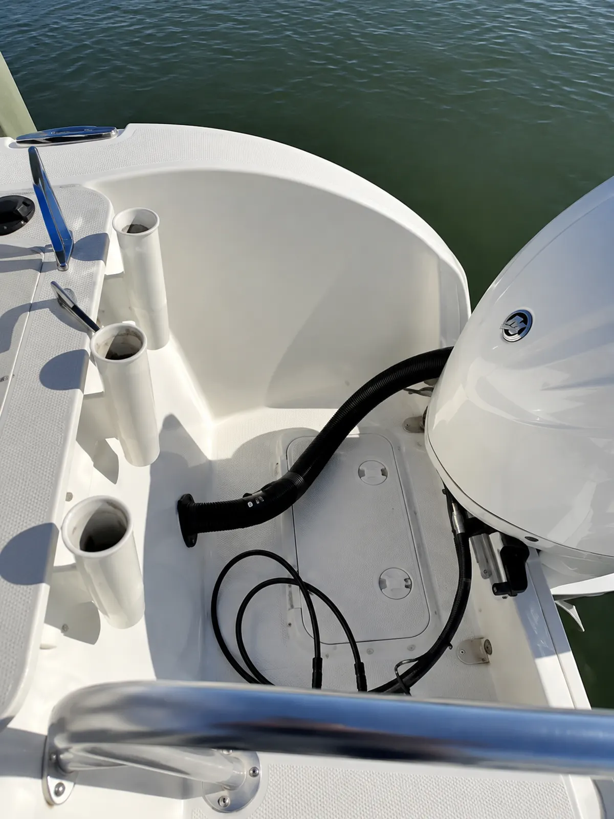 Close-up of a white boat deck surface and fittings after hard water and oxidation removal