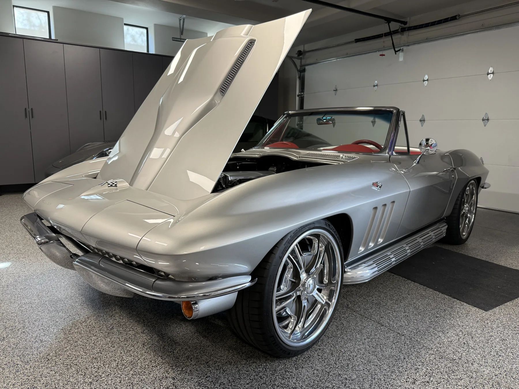 Classic convertible with hood raised for engine bay detailing in Scottsdale, Arizona
