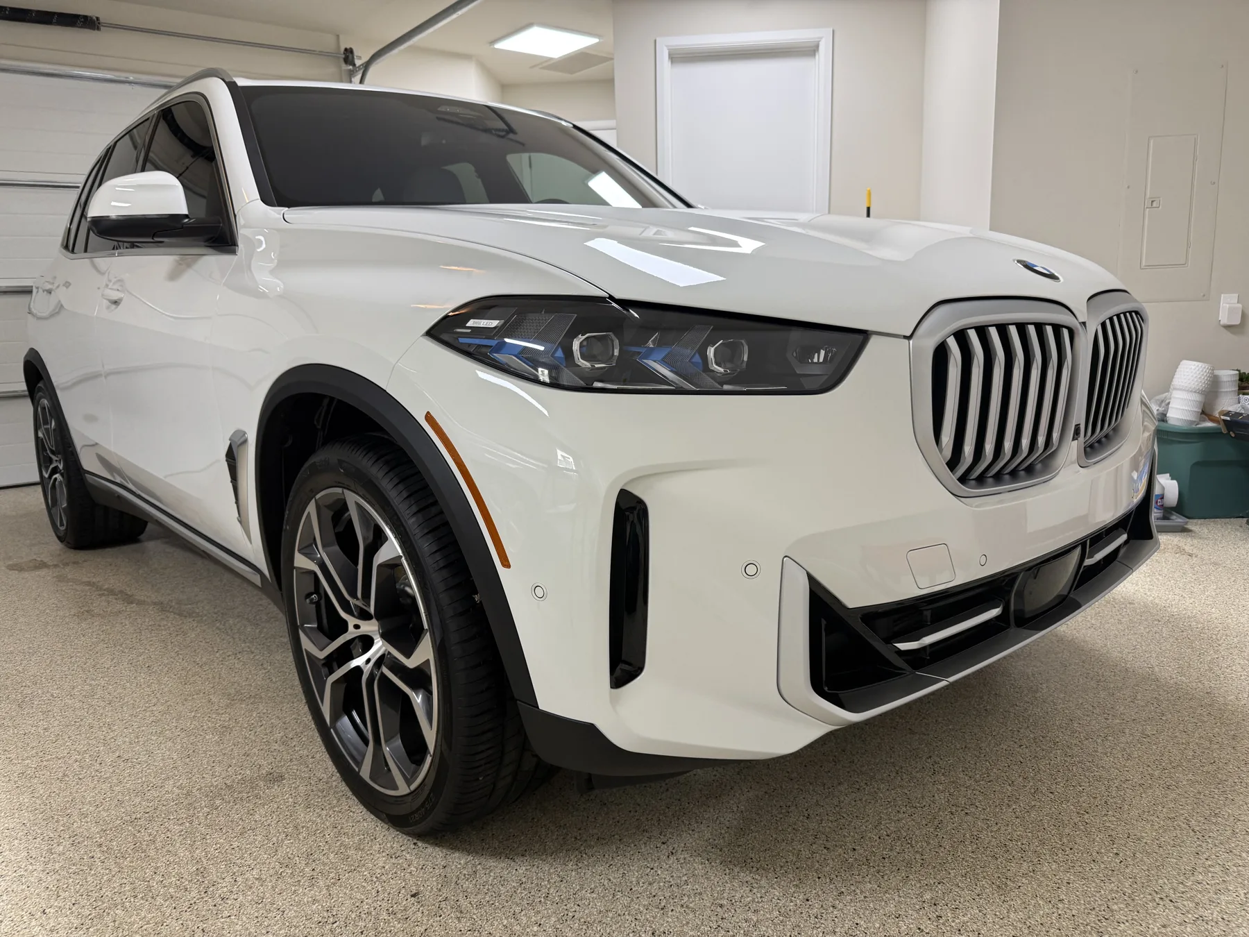 Detailed white luxury SUV after a Desert Steam Detail exterior service in Scottsdale