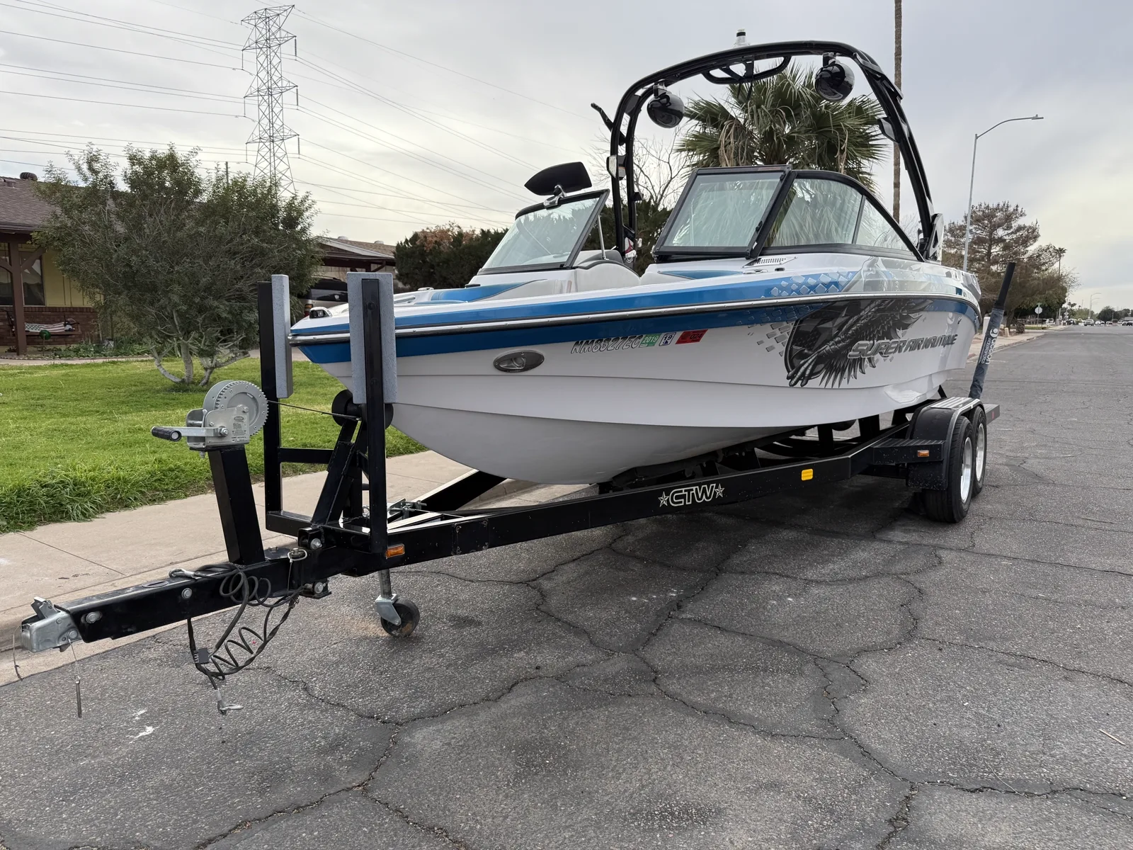 Ski boat with restored gel coat gloss after Desert Steam Detail marine exterior service in Arizona